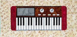 Fabric Confetti & Bruce Allen Designs Feel The Beat Quilt Machine Embroidery CD Finished Size: 54"x74" - BONUS SVG Files