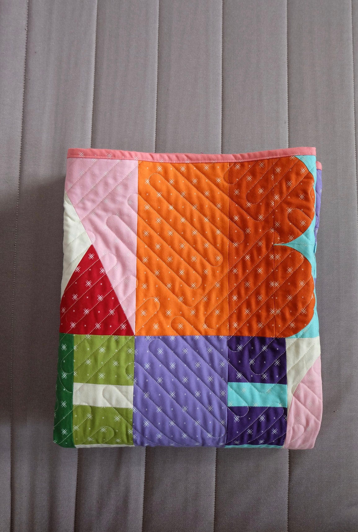 Bound Company Letra Quilt Pattern Finished Size: 44” x 56”