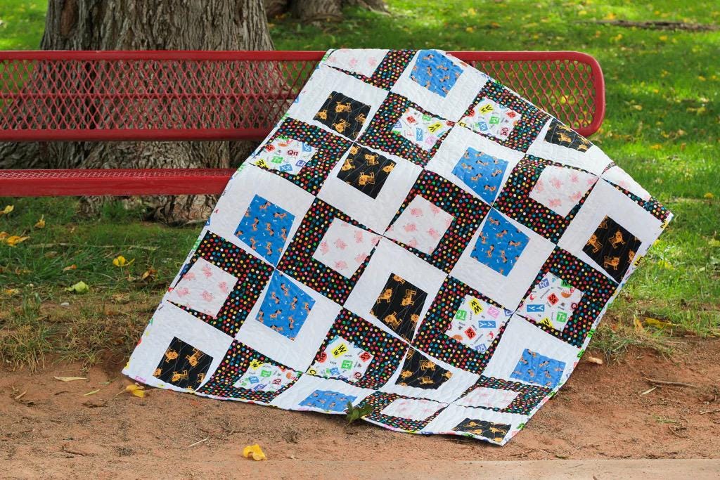 On Williams Street Rough and Tumble Quilt Pattern Finished Size: 44"x58"