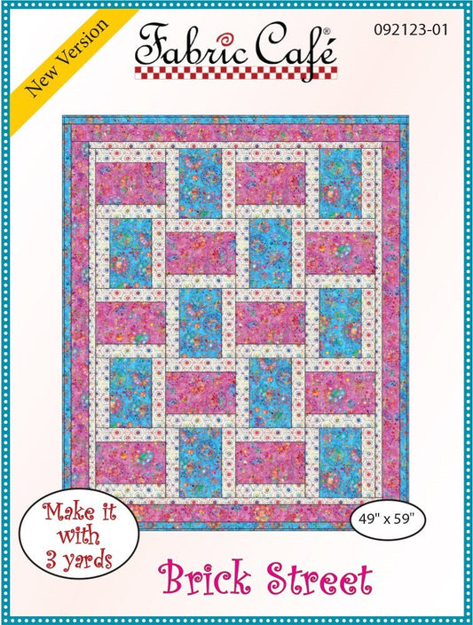 May include: A quilting pattern for a quilt called 'Brick Street.' The pattern is for a quilt that is 49 inches by 59 inches and uses 3 yards of fabric. The quilt is made up of a grid of squares, with alternating squares of pink and blue fabric. The squares are outlined in white. The pattern is from Fabric Cafe and is a new version. The pattern number is 092123-01.