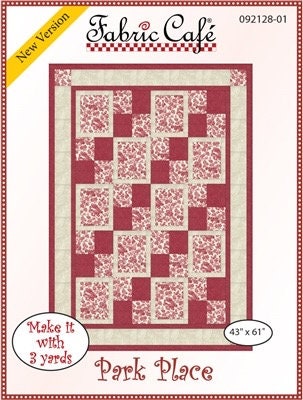 May include: A quilting pattern for a quilt called 'Park Place.' The pattern is for a quilt that is 43 inches by 61 inches and can be made with 3 yards of fabric. The quilt is made up of a grid of squares with a red and white floral pattern. The pattern is from Fabric Cafe and is a new version.