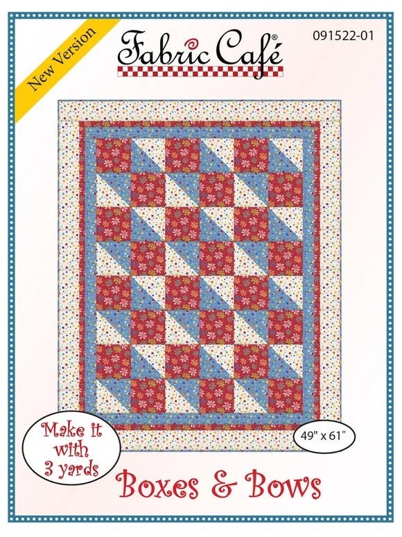 May include: A quilting pattern for a quilt called 'Boxes & Bows.' The pattern is from Fabric Cafe and is 49 inches by 61 inches. The quilt is made with red, blue, and white fabric with a floral pattern. The pattern is labeled 'New Version' and has the number 091522-01. The pattern is for a quilt that can be made with 3 yards of fabric.