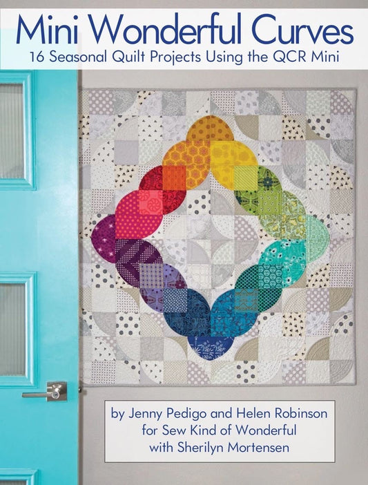 May include: Mini Wonderful Curves quilt book cover featuring a colorful quilt design with a rainbow of colors. The book title is 'Mini Wonderful Curves' and the subtitle is '16 Seasonal Quilt Projects Using the QCR Mini'. The authors are Jenny Pedigo and Helen Robinson for Sew Kind of Wonderful with Sherilyn Mortensen.