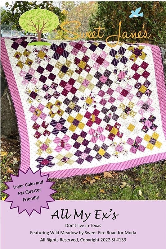 May include: A quilt pattern called "All My Ex's" featuring a patchwork design with purple, pink, white, and gold fabrics. The quilt is made with layer cake and fat quarter friendly fabrics. The pattern is by Sweet Jane's Quilting and Design.