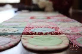 Hugs'N Kisses Gran's Favorite Jam Drops Table Runner Pattern Finished Size: 9"x39" (Includes Precut Applique Circles)
